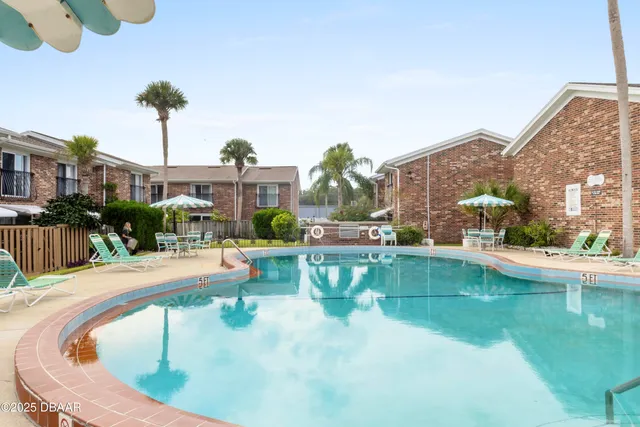 a bathroom with a toilet and shower