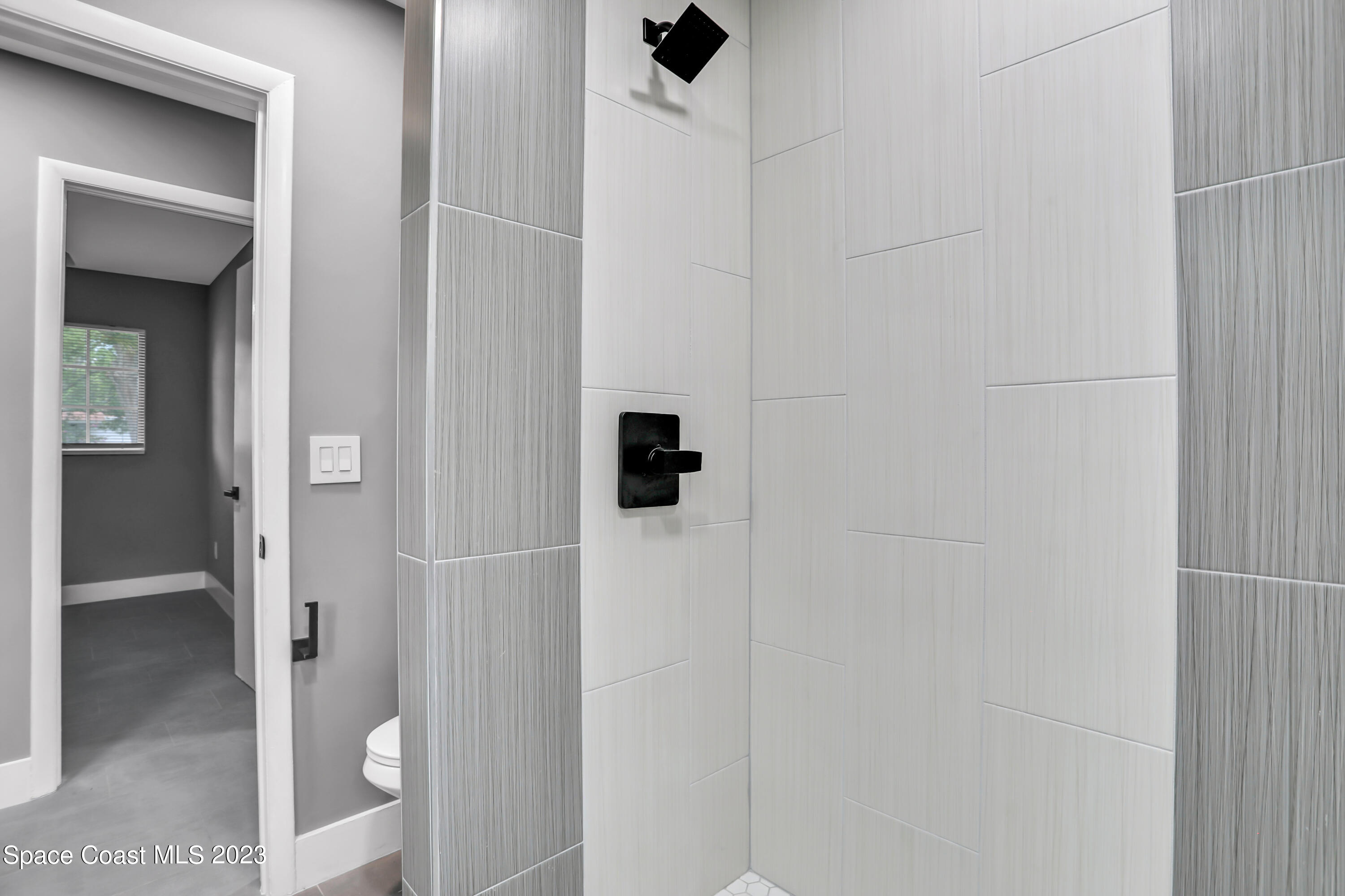 1905 Exeter Drive Cocoa, FL 32922 - Photo 20 of 37 a bathroom with a shower