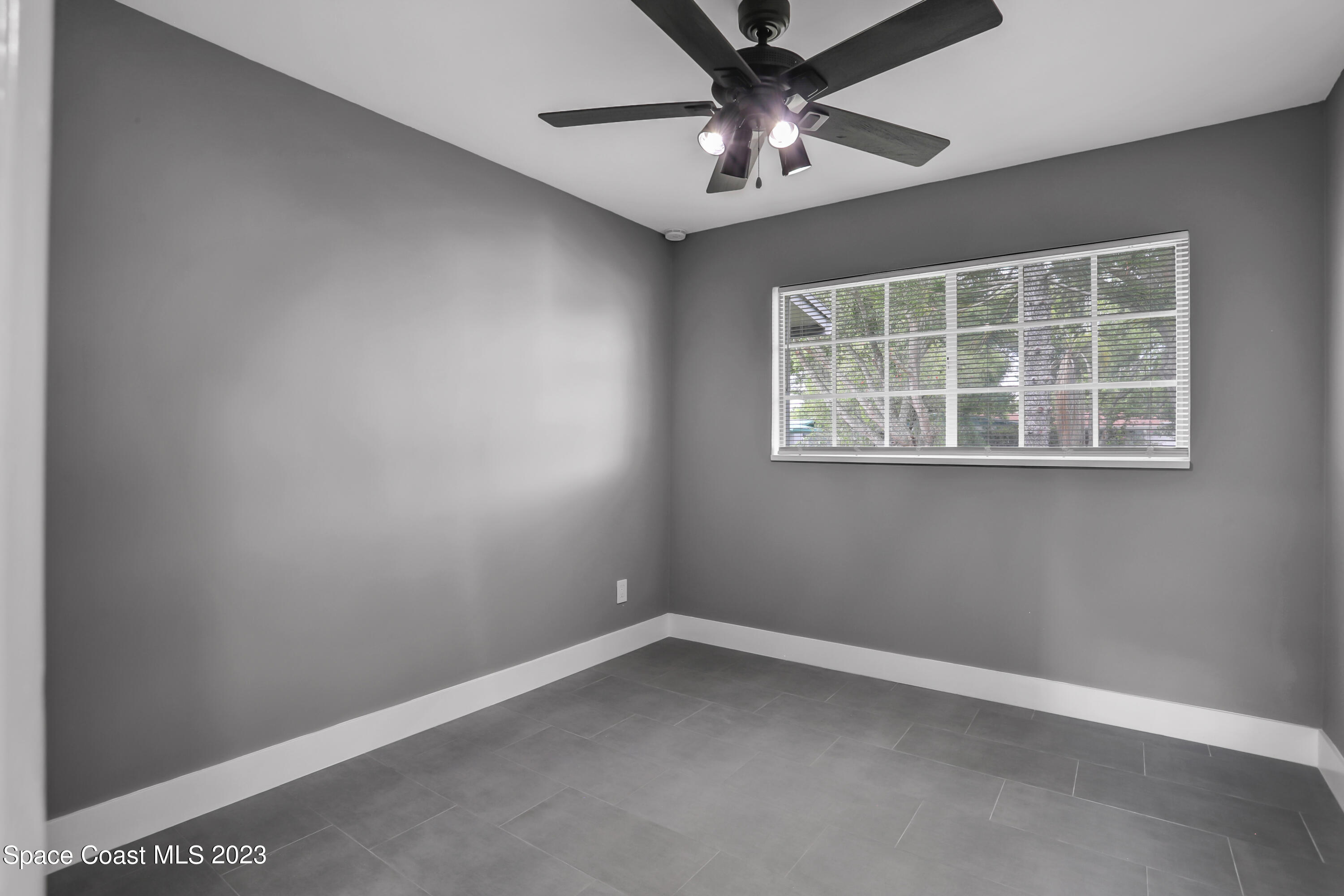 1905 Exeter Drive Cocoa, FL 32922 - Photo 21 of 37 an empty room with a window