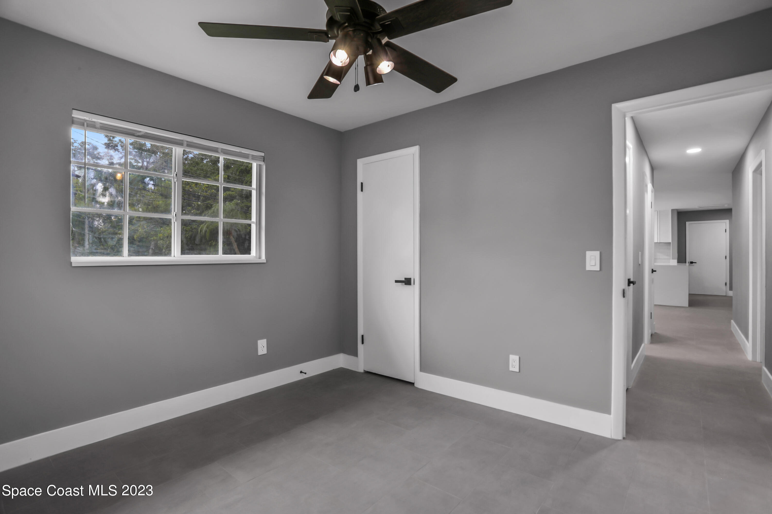 1905 Exeter Drive Cocoa, FL 32922 - Photo 26 of 37 a view of an empty room with a window