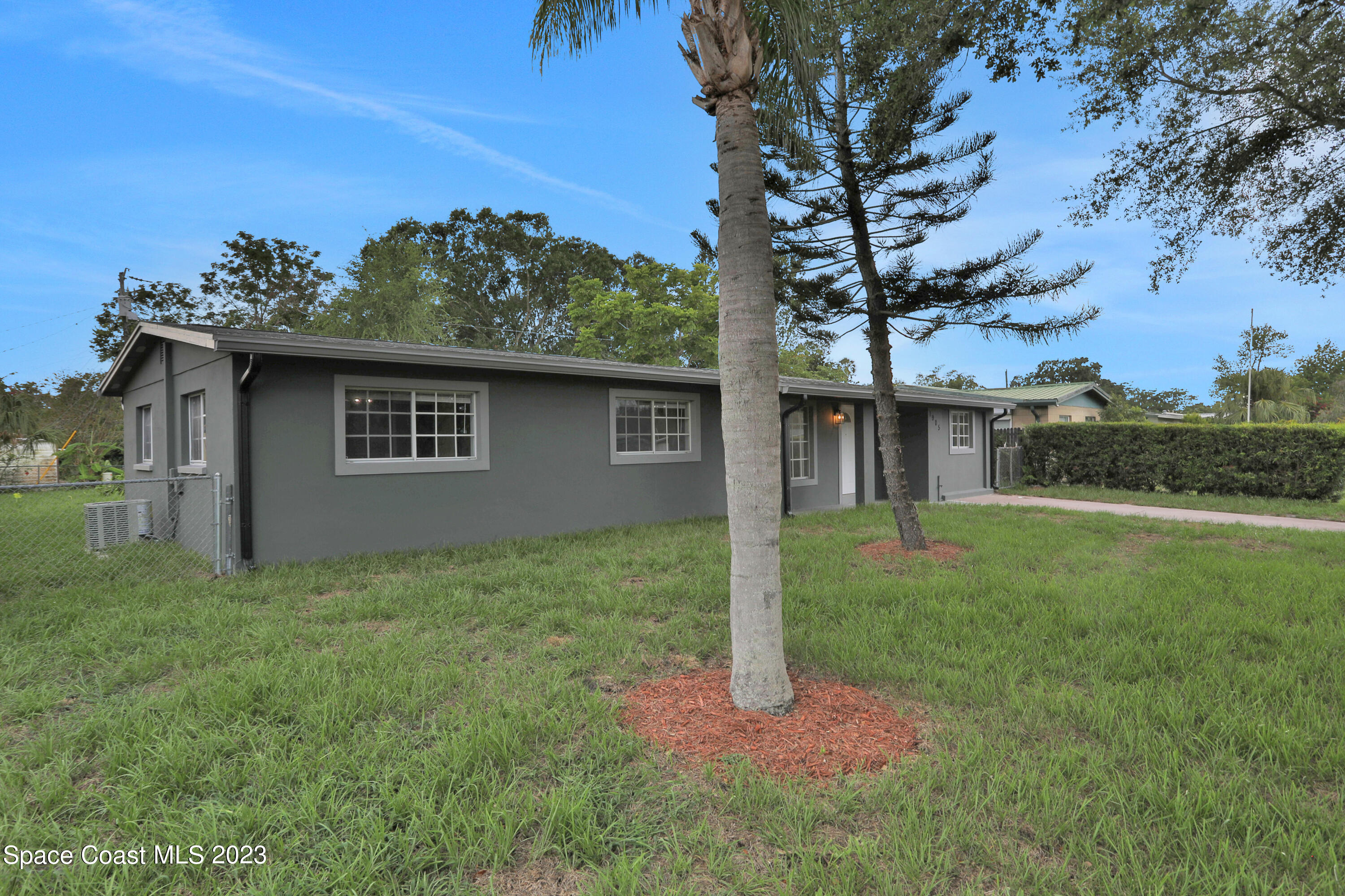 1905 Exeter Drive Cocoa, FL 32922 - Photo 3 of 37 a view of a house with a yard