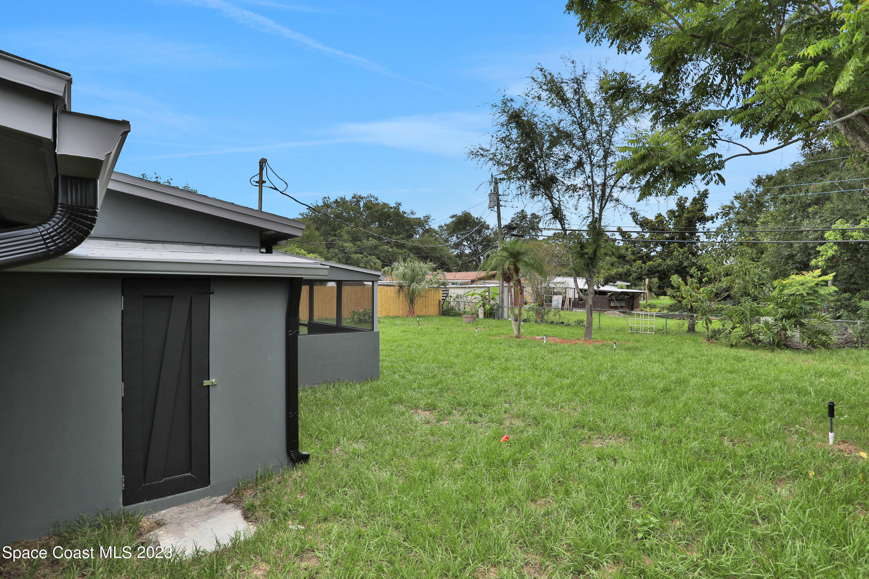 1905 Exeter Drive Cocoa, FL 32922 - Photo 34 of 37 a house view with a garden space