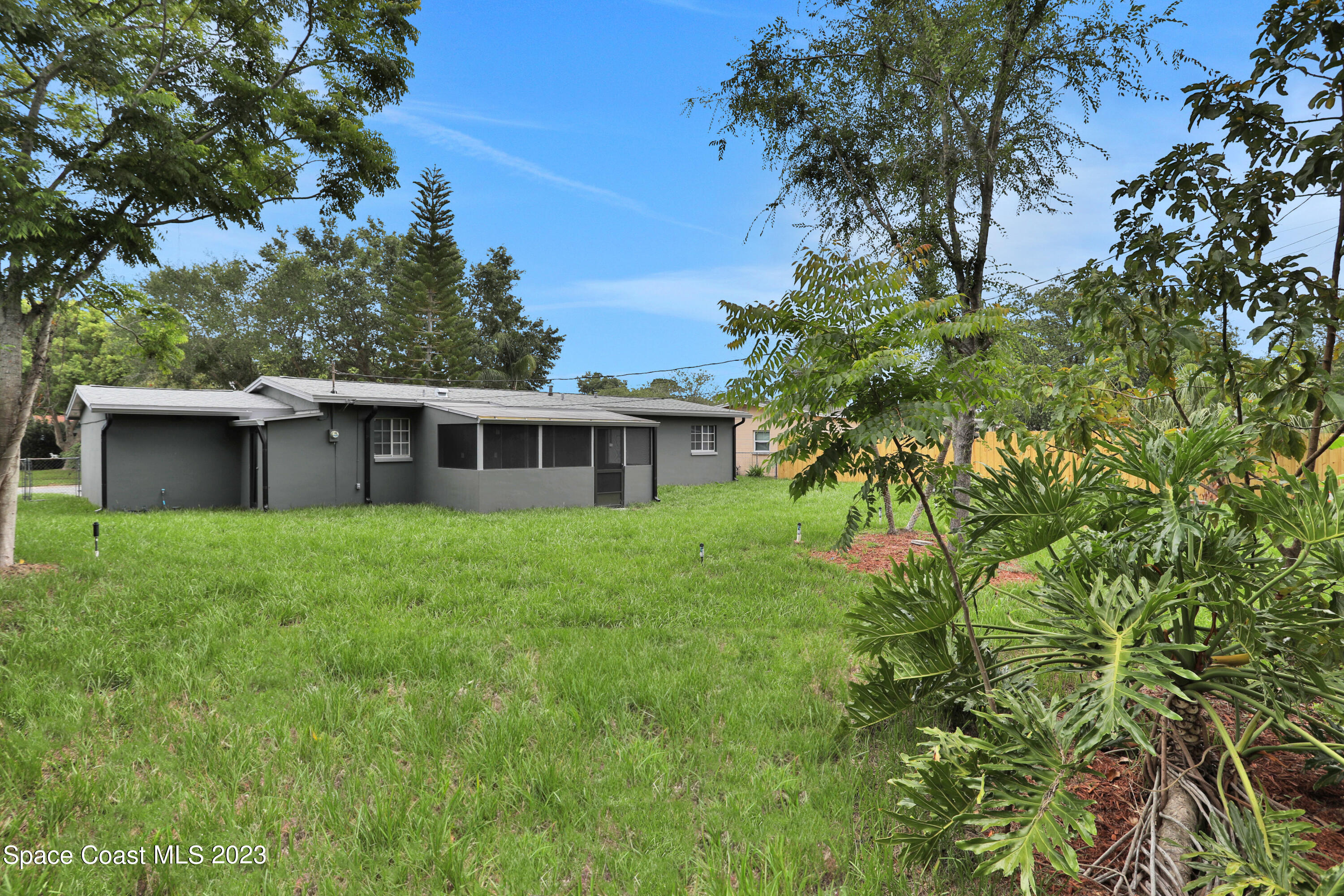 1905 Exeter Drive Cocoa, FL 32922 - Photo 36 of 37 a view of a house with a yard