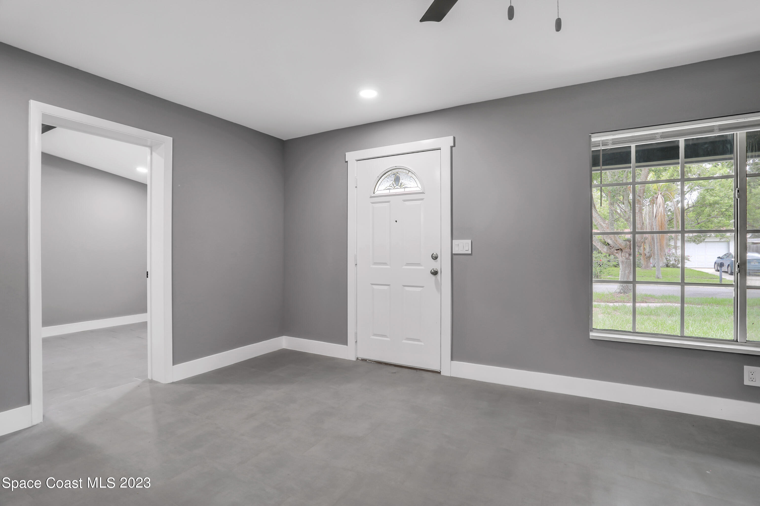 1905 Exeter Drive Cocoa, FL 32922 - Photo 5 of 37 an empty room with windows