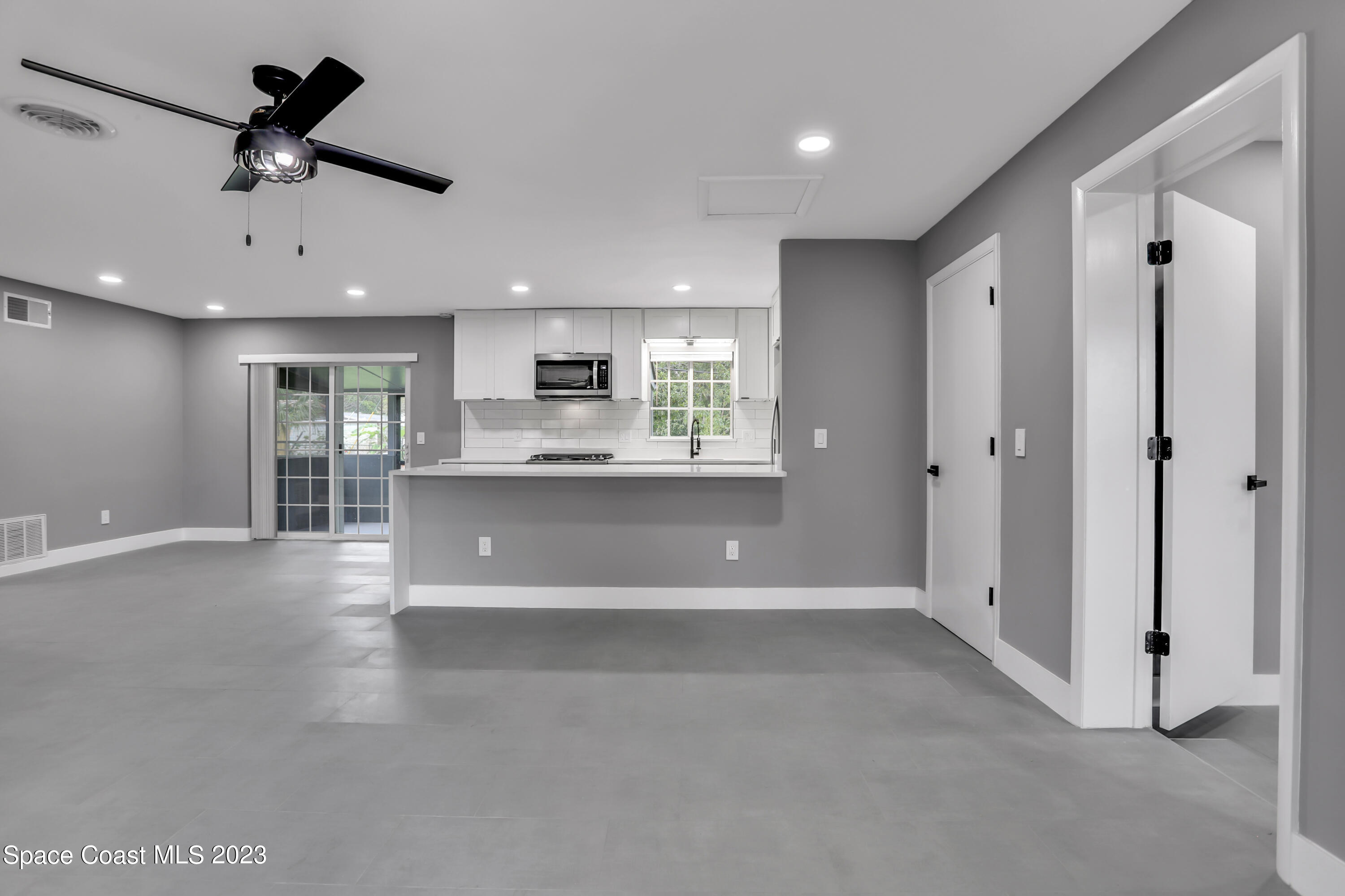 1905 Exeter Drive Cocoa, FL 32922 - Photo 7 of 37 a view of a kitchen with a sink and cabinet area
