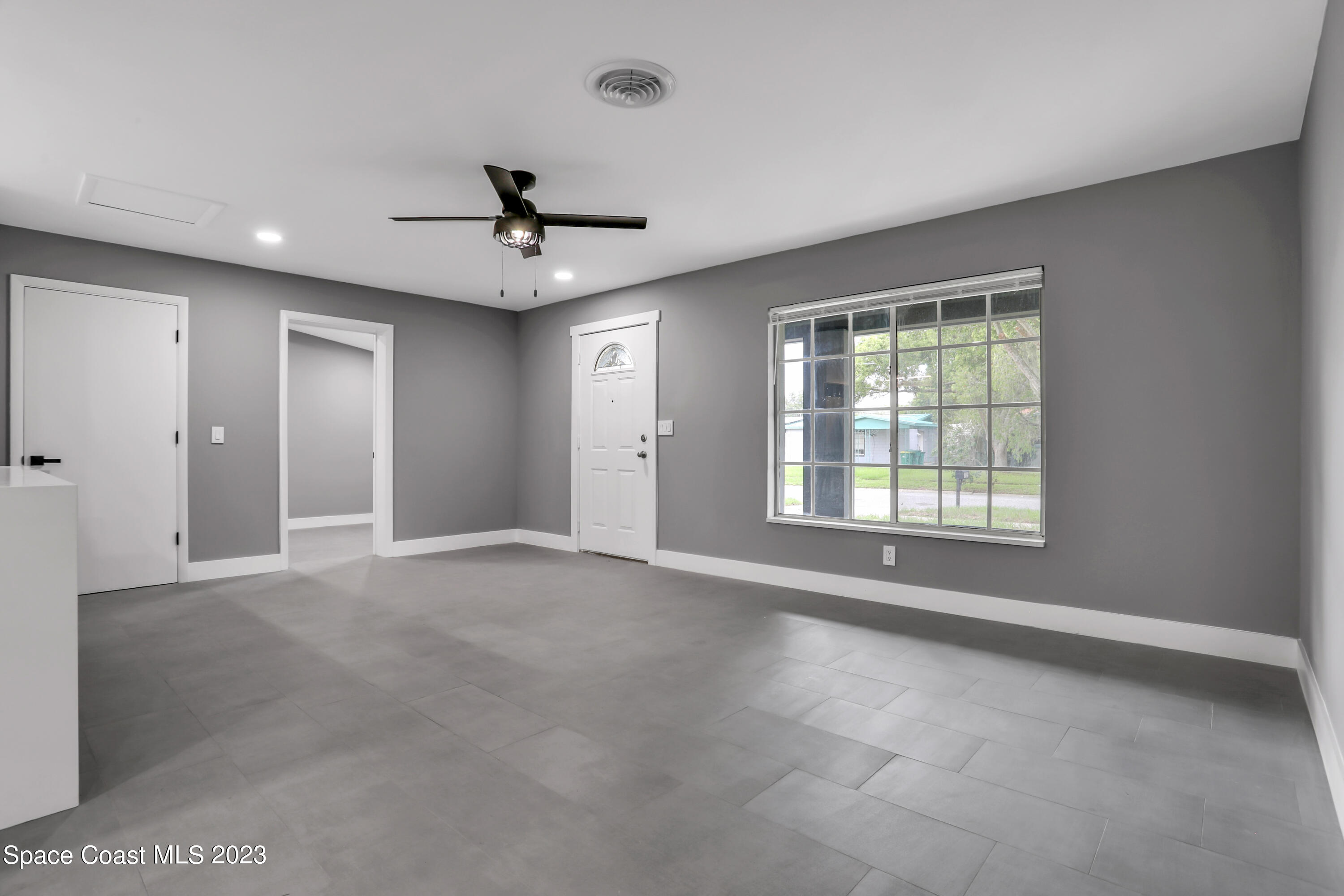 1905 Exeter Drive Cocoa, FL 32922 - Photo 9 of 37 a view of an empty room with a window