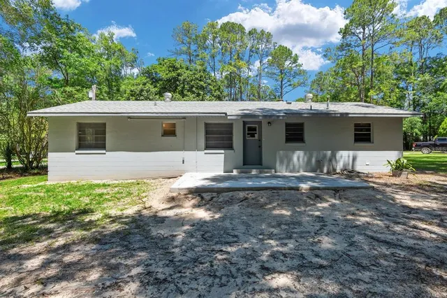 a front view of house with yard
