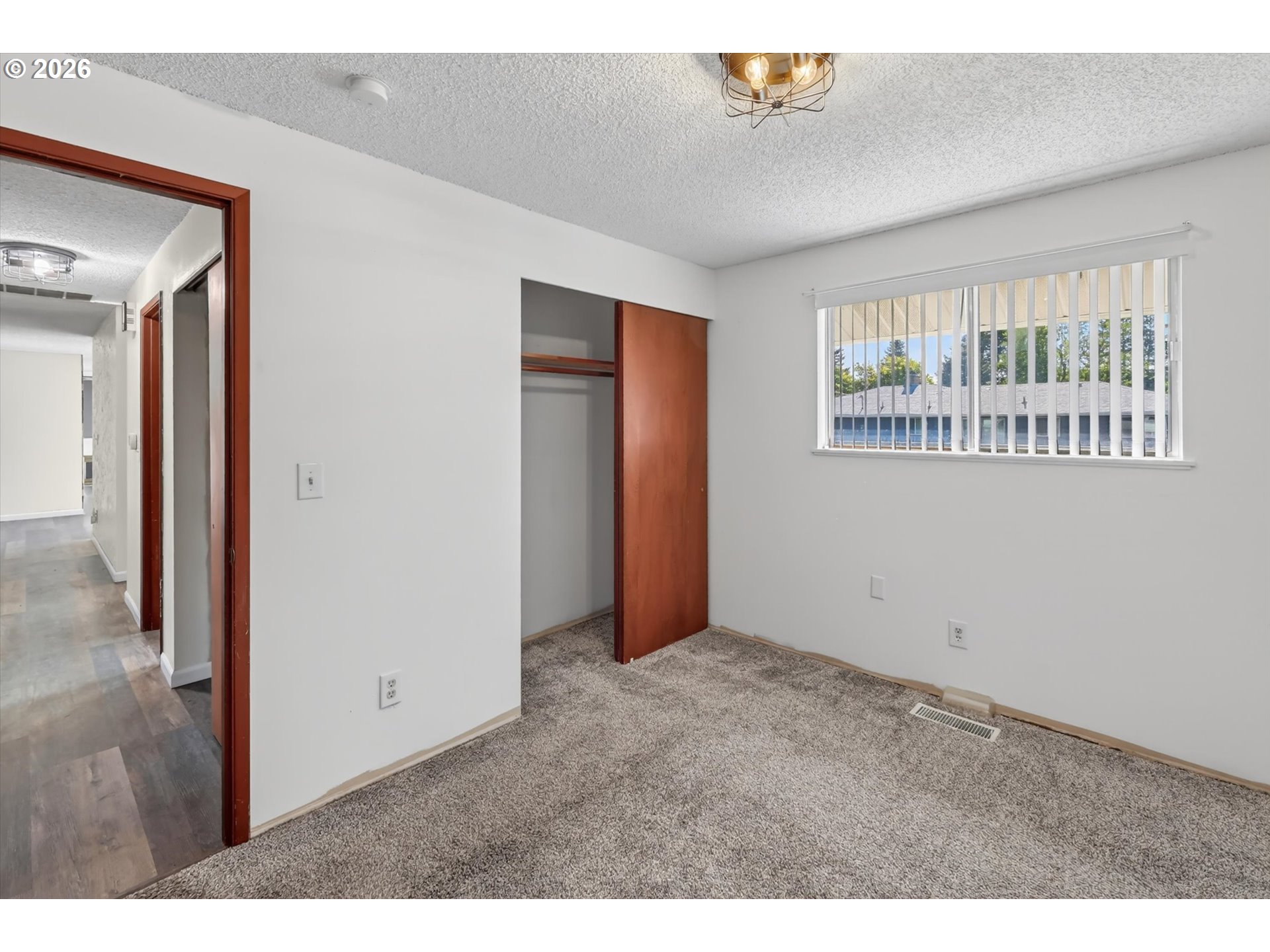 1035 Southeast 225th Avenue Gresham, OR 97030 - Photo 28 of 39 a view of an empty room with a window