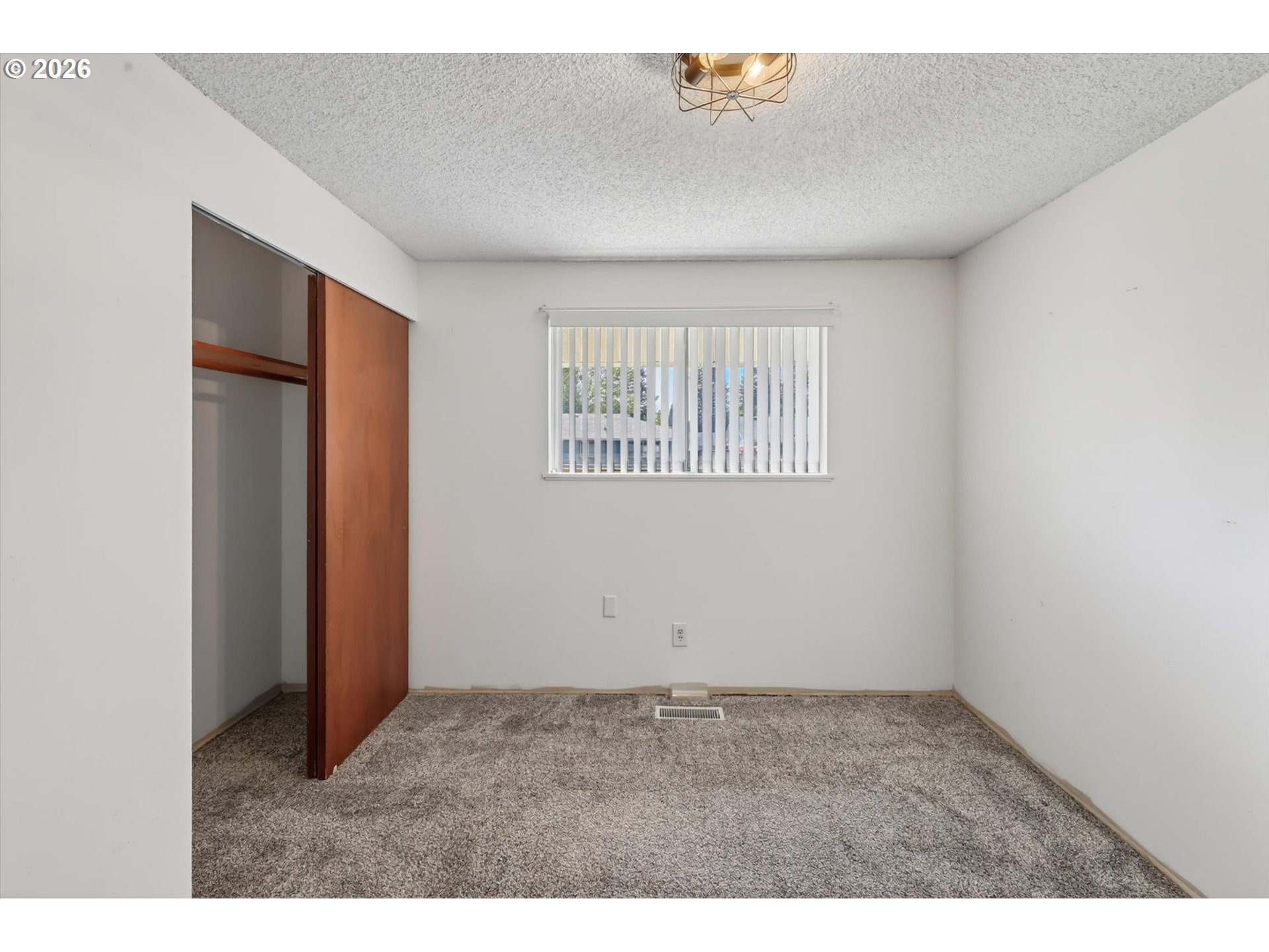 1035 Southeast 225th Avenue Gresham, OR 97030 - Photo 29 of 39 an empty room with windows