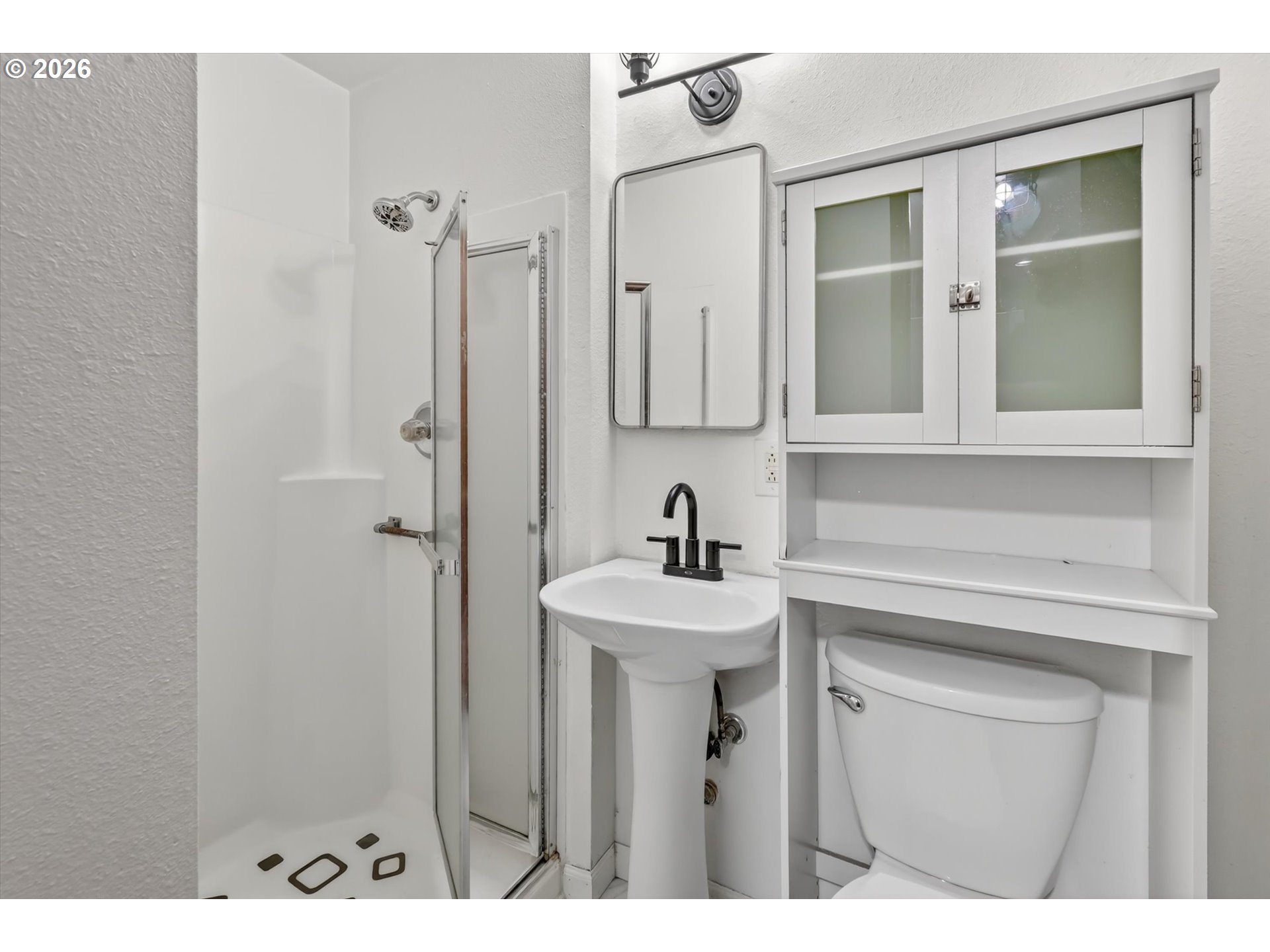 1035 Southeast 225th Avenue Gresham, OR 97030 - Photo 31 of 39 a bathroom with a sink a mirror and a vanity
