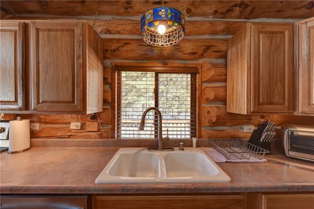 2206 Campfire Road Hartsel, CO 80449 - Photo 11 of 35 a view of a kitchen with a sink and a window