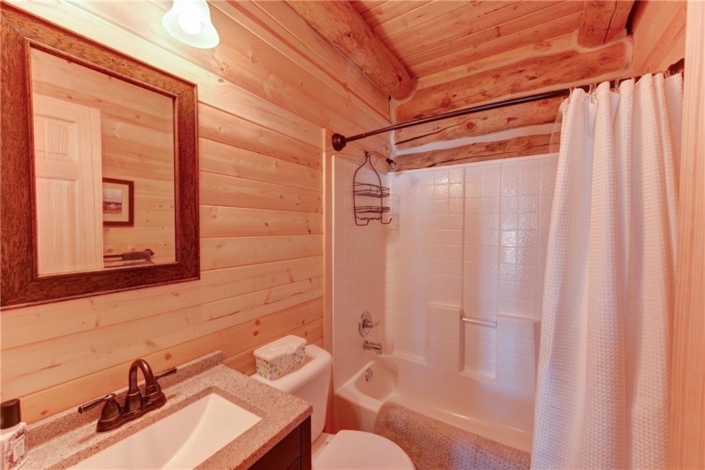 2206 Campfire Road Hartsel, CO 80449 - Photo 16 of 35 a bathroom with a sink toilet and shower