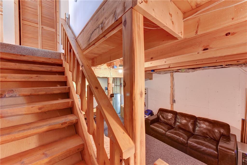 2206 Campfire Road Hartsel, CO 80449 - Photo 23 of 35 a view of entryway with wooden floor and stairs