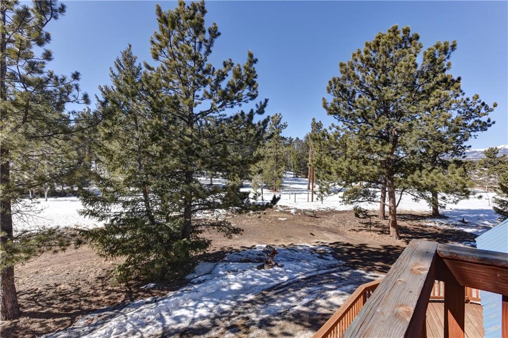 2206 Campfire Road Hartsel, CO 80449 - Photo 31 of 35 a view of a yard with wooden fence