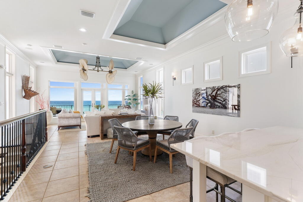 4748 Ocean Boulevard Destin, FL 32541 - Photo 12 of 80 a dining room with furniture and wooden floor