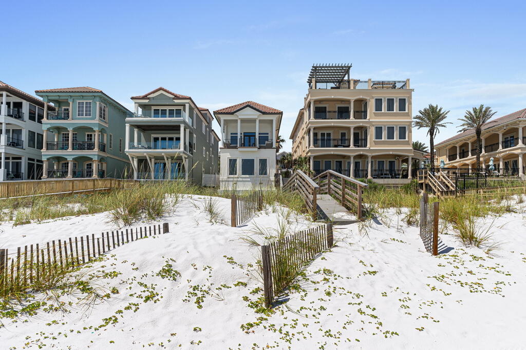 4748 Ocean Boulevard Destin, FL 32541 - Photo 24 of 80 a view of a swimming pool with a lounge chairs