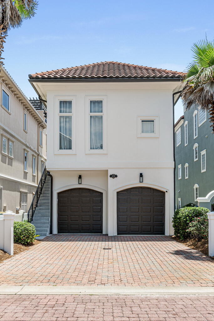 4748 Ocean Boulevard Destin, FL 32541 - Photo 26 of 80 a front view of house with yard