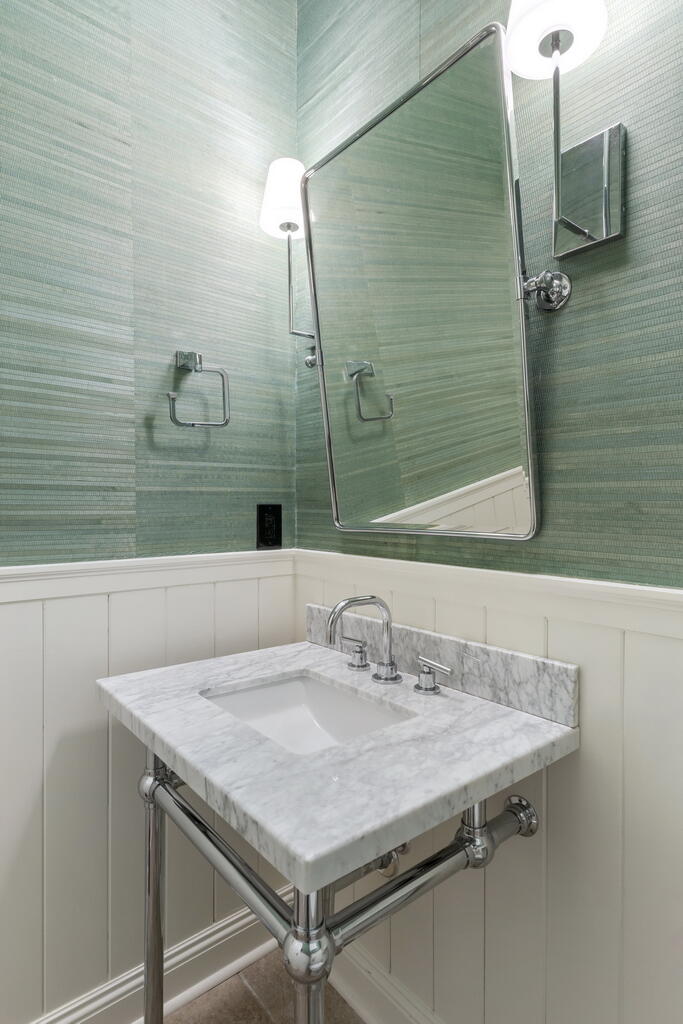 4748 Ocean Boulevard Destin, FL 32541 - Photo 29 of 80 a bathroom with a sink and a mirror