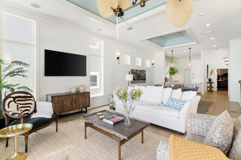 4748 Ocean Boulevard Destin, FL 32541 - Photo 43 of 80 a living room with furniture and a flat screen tv