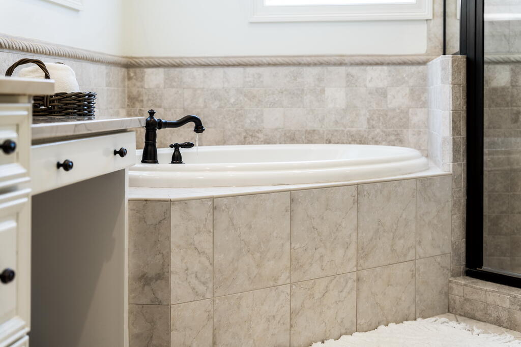 4748 Ocean Boulevard Destin, FL 32541 - Photo 55 of 80 a bathroom with a bathtub and sink