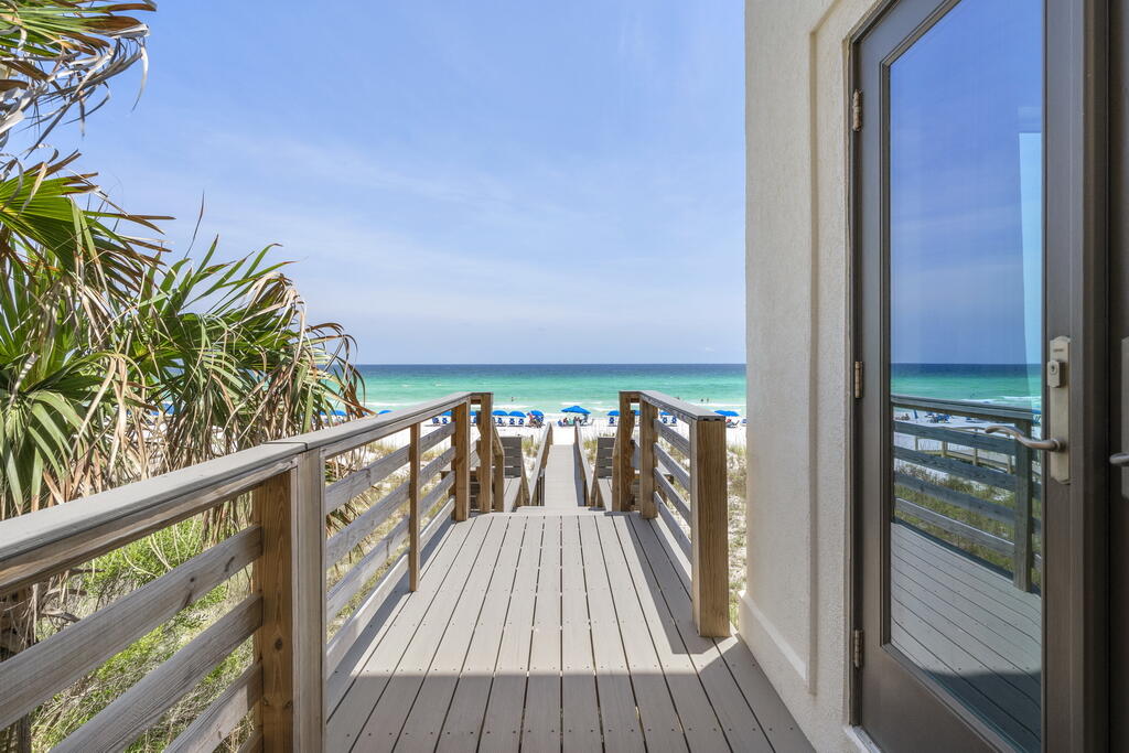 4748 Ocean Boulevard Destin, FL 32541 - Photo 64 of 80 a view of balcony with wooden floor and outdoor space