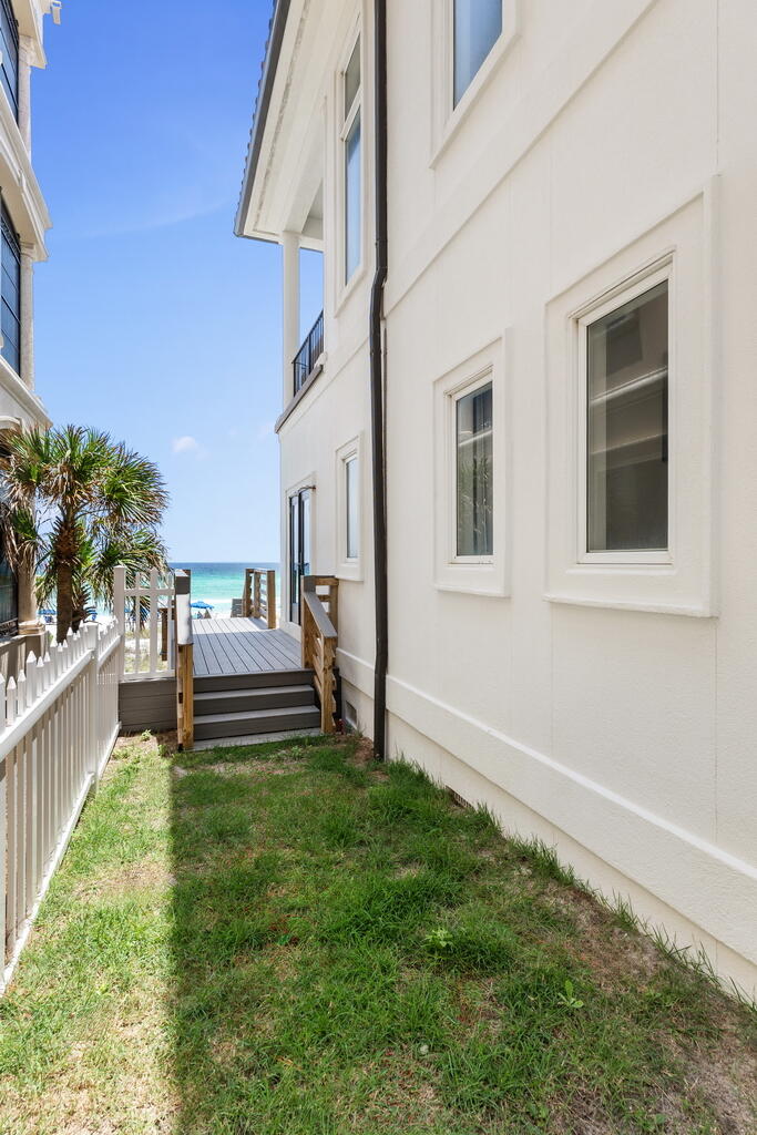 4748 Ocean Boulevard Destin, FL 32541 - Photo 68 of 80 a view of a house with backyard and sitting area