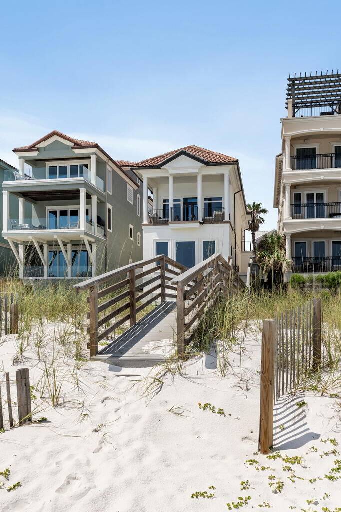 4748 Ocean Boulevard Destin, FL 32541 - Photo 72 of 80 a front view of a house with a yard
