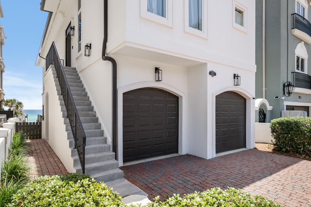 4748 Ocean Boulevard Destin, FL 32541 - Photo 76 of 80 a front view of a house with a garage