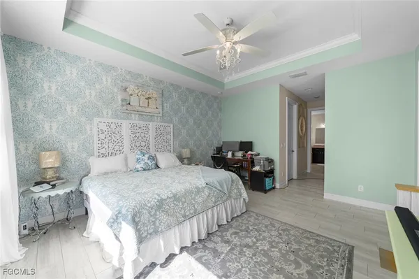 a large bathroom with a large tub sink and toilet