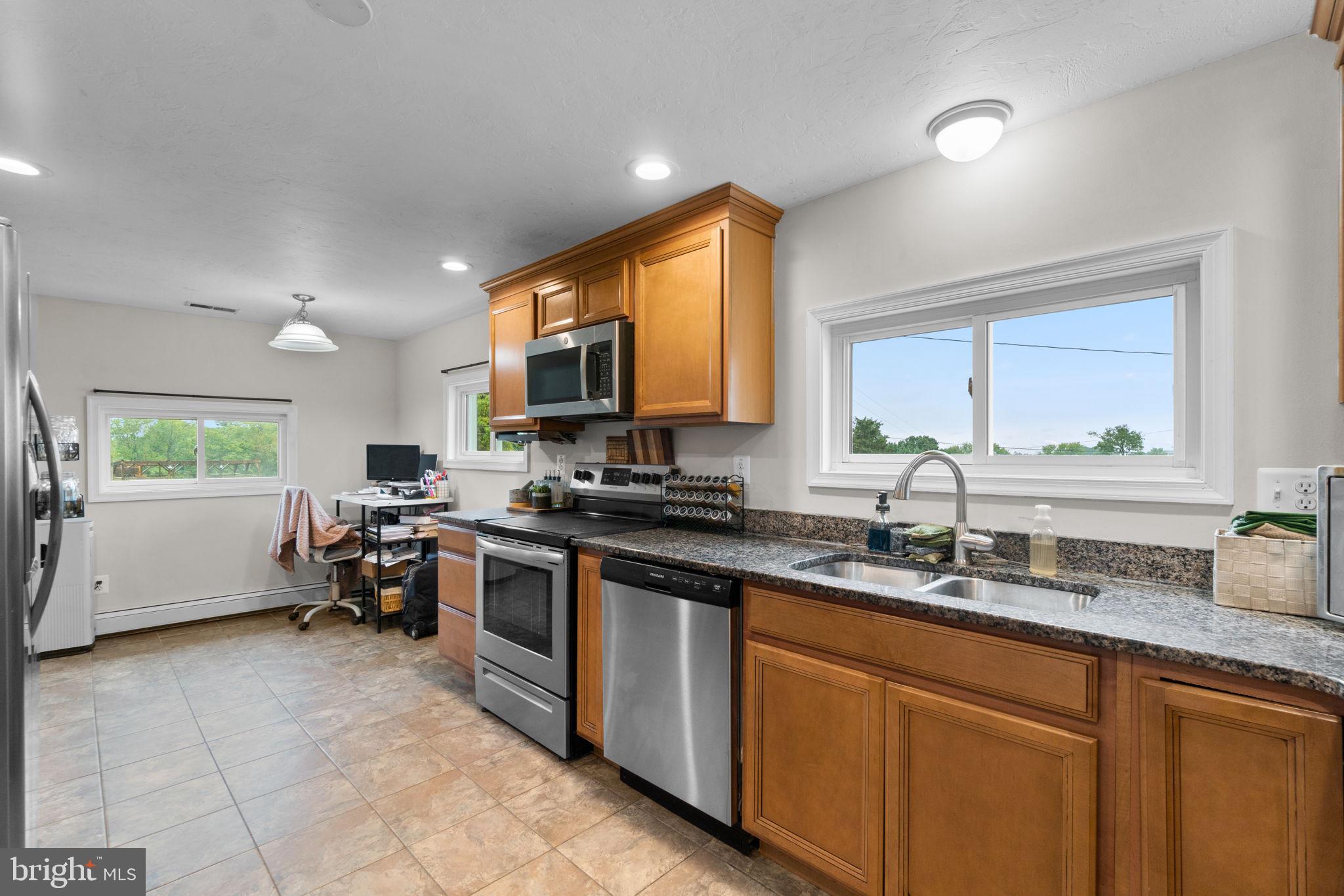 1272 Cherrytown Road Westminster, MD 21158 - Photo 11 of 30 a kitchen with lots of counter top space and a window