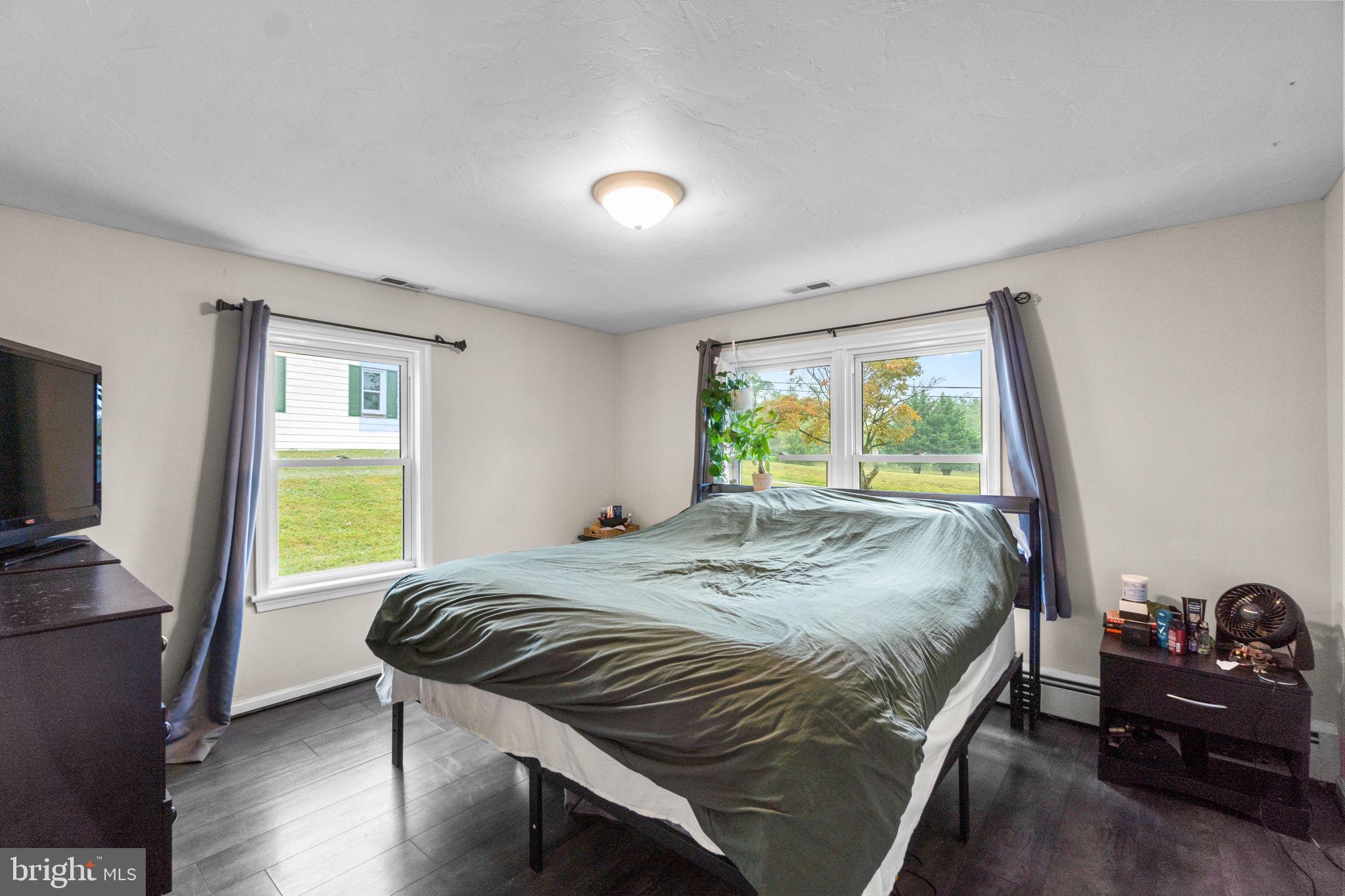 1272 Cherrytown Road Westminster, MD 21158 - Photo 13 of 30 a bedroom with a bed and a window