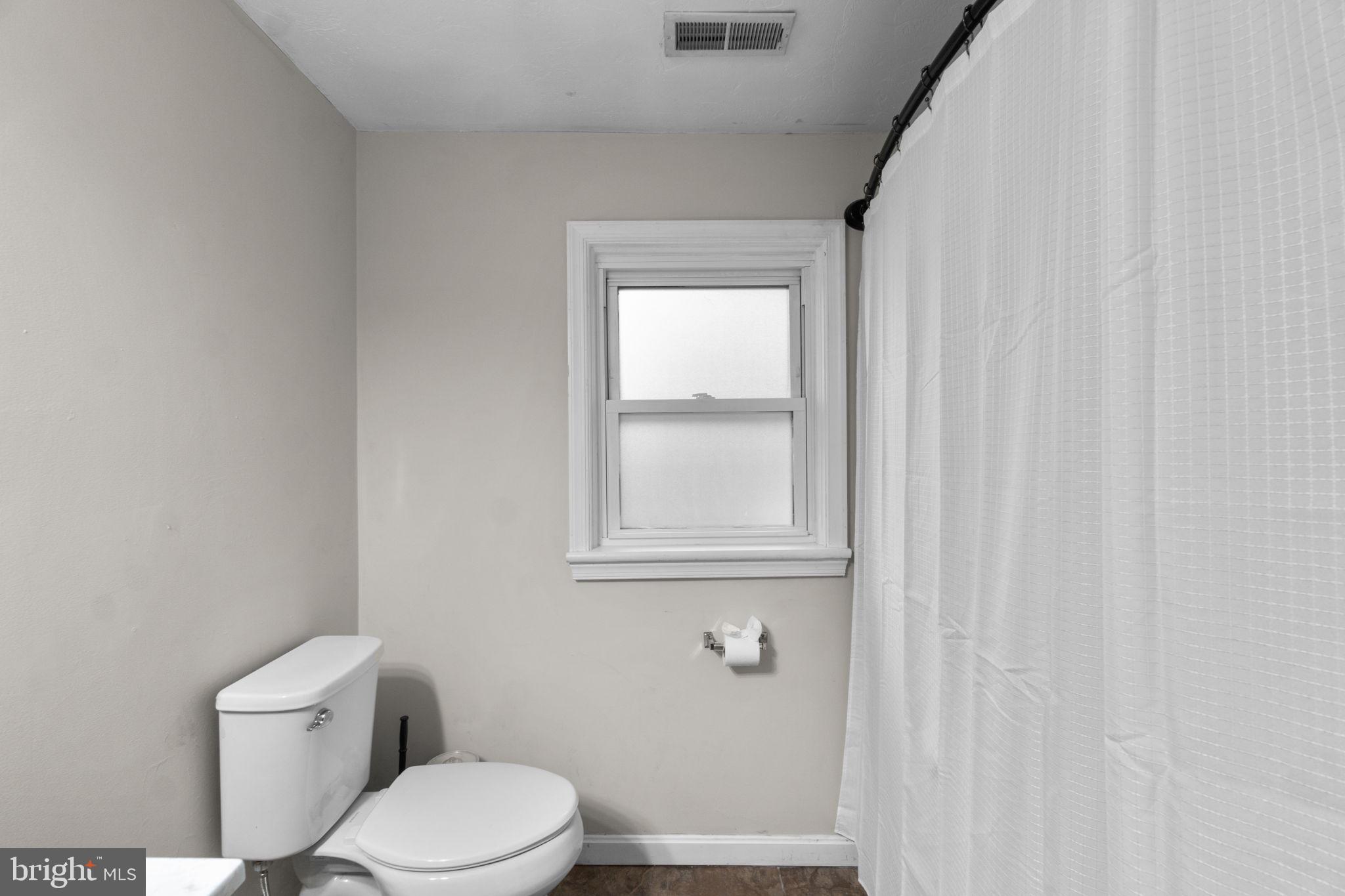 1272 Cherrytown Road Westminster, MD 21158 - Photo 17 of 30 a white toilet sitting next to a shower