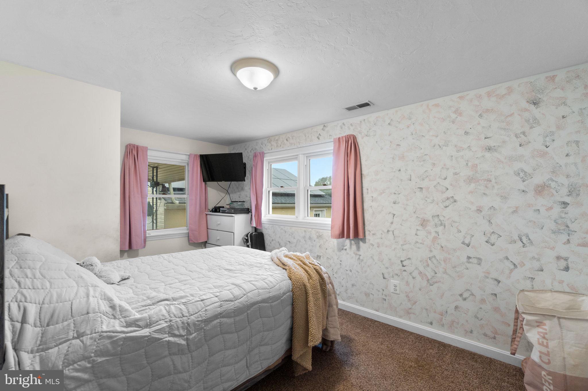 1272 Cherrytown Road Westminster, MD 21158 - Photo 18 of 30 a bedroom with a bed and a window