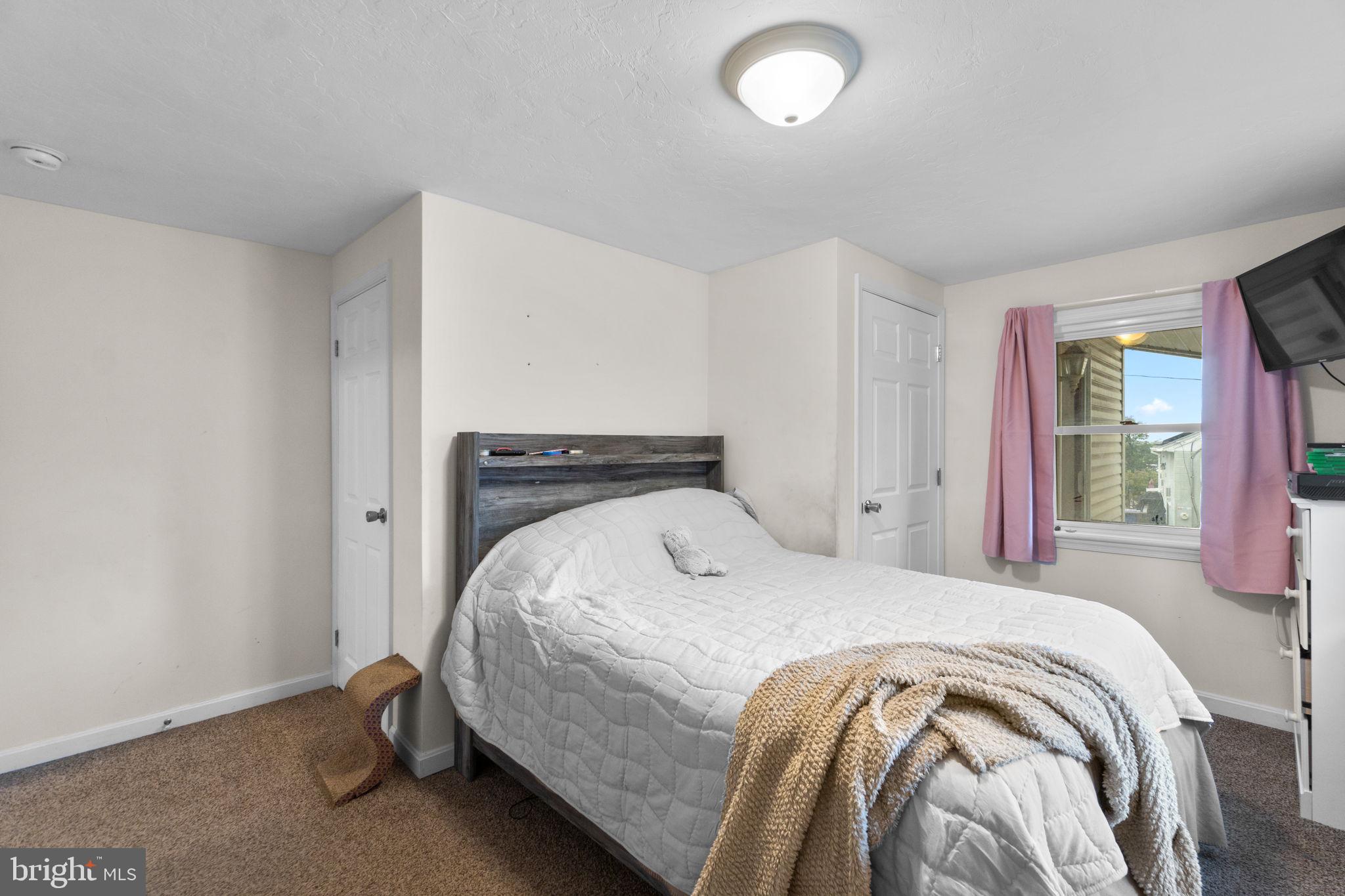 1272 Cherrytown Road Westminster, MD 21158 - Photo 19 of 30 a bedroom with a bed and a window