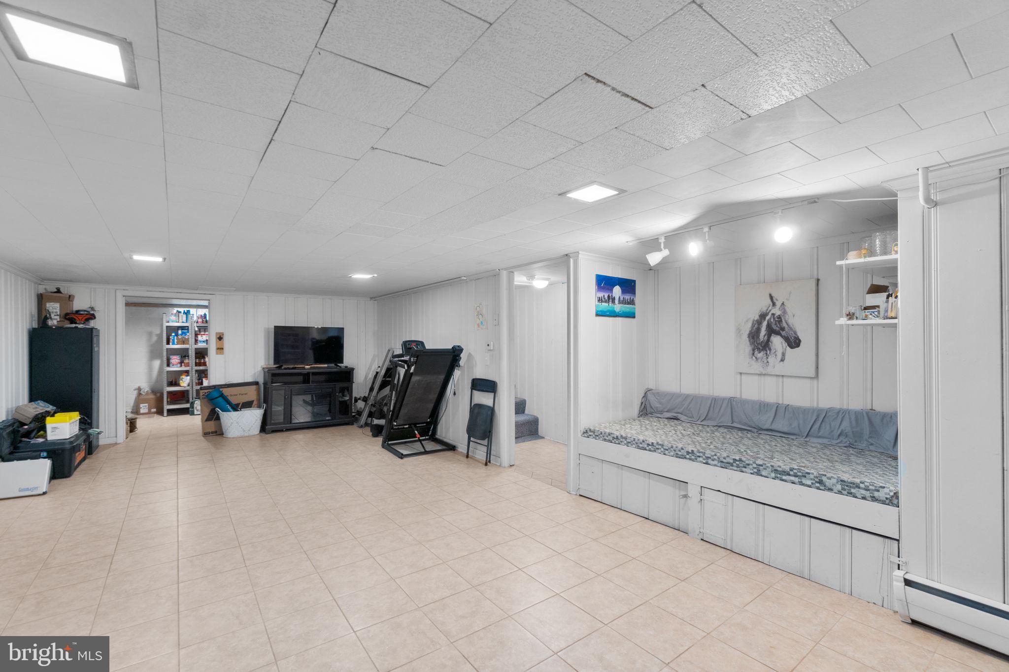 1272 Cherrytown Road Westminster, MD 21158 - Photo 20 of 30 a view of kitchen with furniture and a flat screen tv