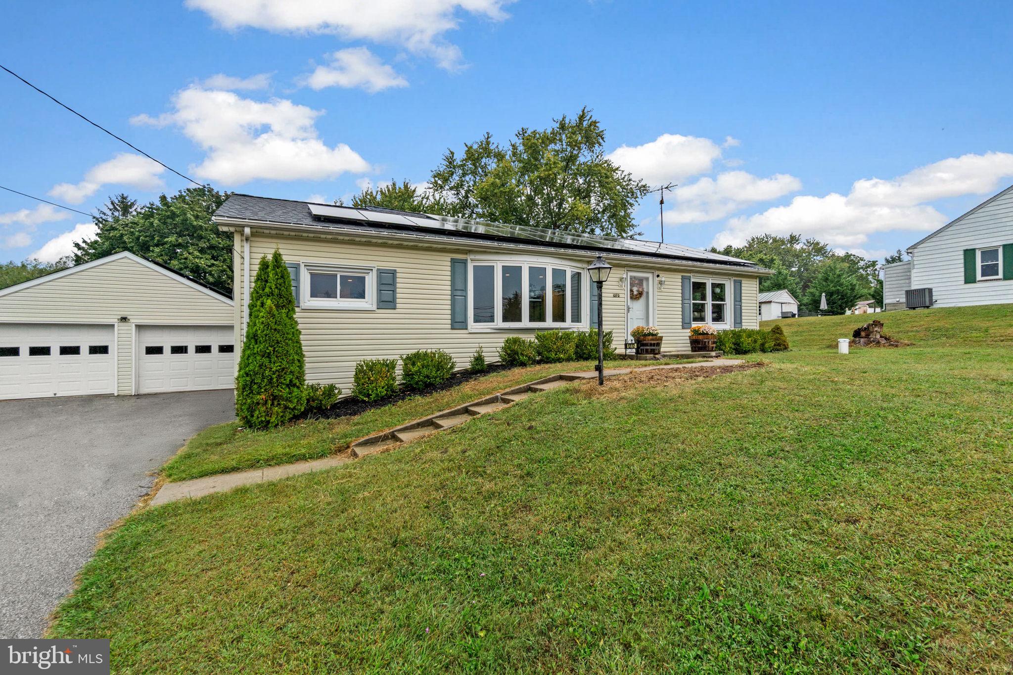 1272 Cherrytown Road Westminster, MD 21158 - Photo 2 of 30 a front view of a house with a yard and trees