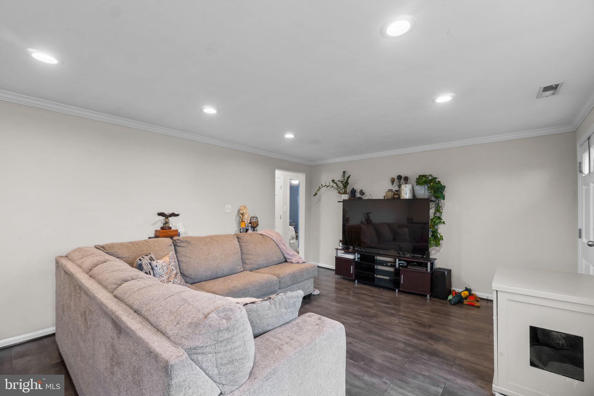 1272 Cherrytown Road Westminster, MD 21158 - Photo 5 of 30 a living room with furniture and a flat screen tv