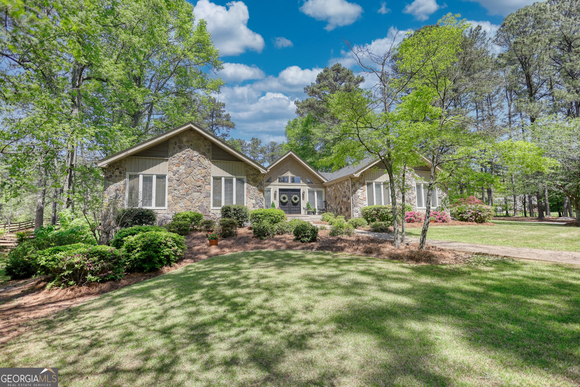 346 Potts Road Southeast Conyers, GA 30094 - Photo 1 of 1 a front view of a house with a yard