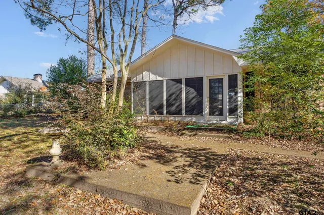 a view of a golf course with a lake