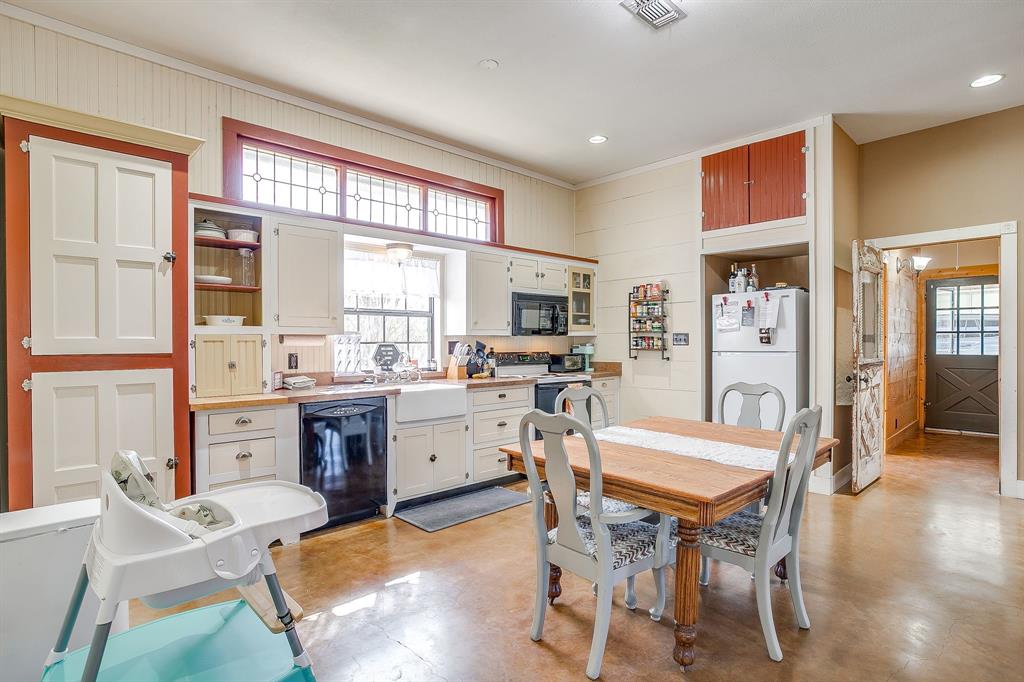 4200 Farm To Market 920 Weatherford, TX 76088 - Photo 12 of 40 a view of a dining room with furniture window and wooden floor