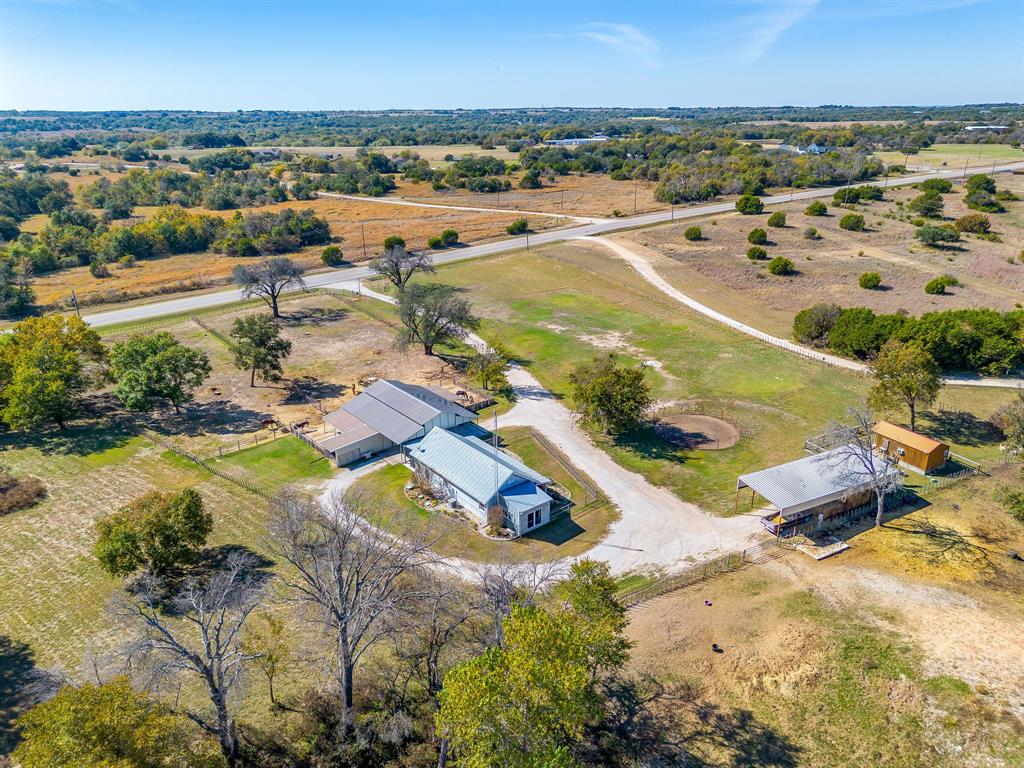 4200 Farm To Market 920 Weatherford, TX 76088 - Photo 2 of 40 an aerial view of residential houses with outdoor space