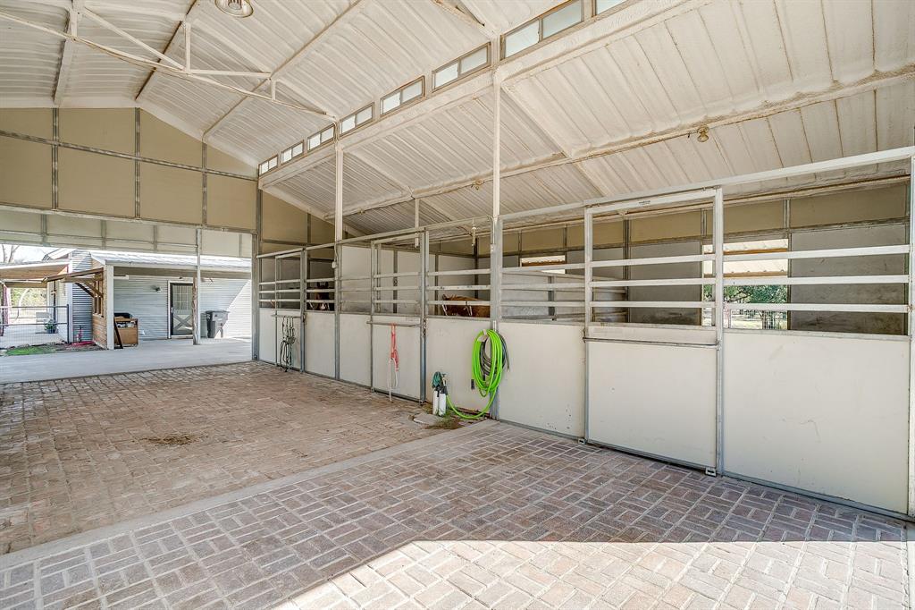 4200 Farm To Market 920 Weatherford, TX 76088 - Photo 25 of 40 a view of a garage with storage