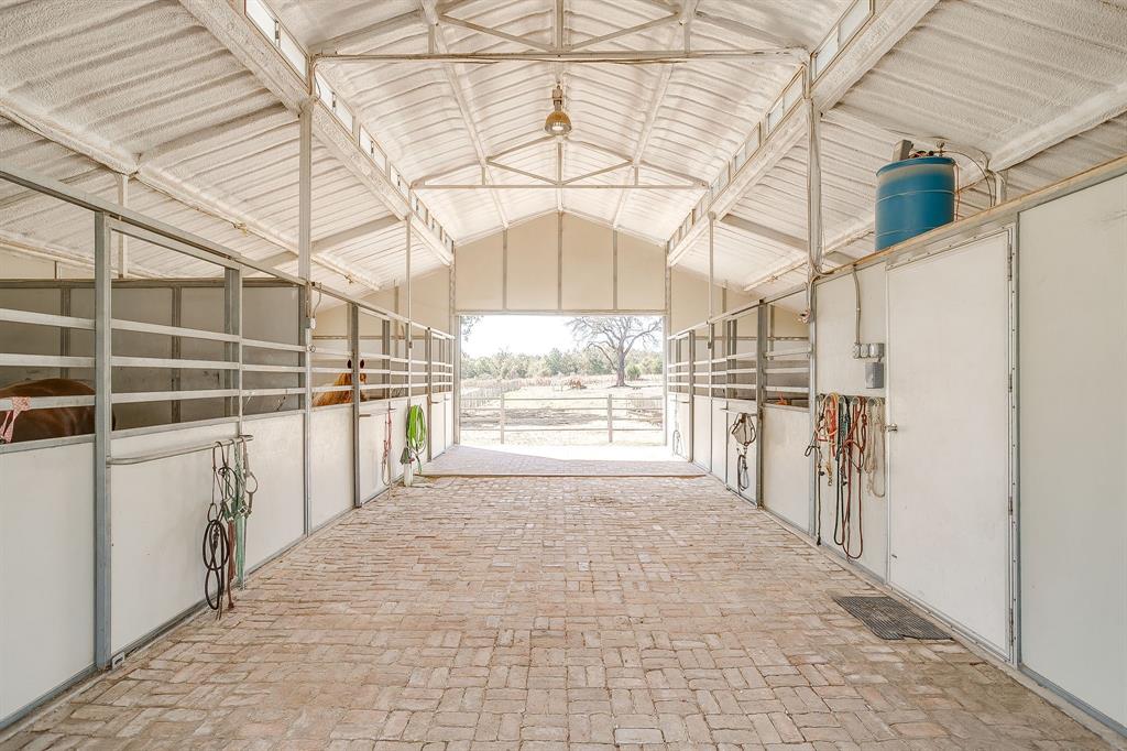 4200 Farm To Market 920 Weatherford, TX 76088 - Photo 26 of 40 a view of a bathroom with a sink and windows