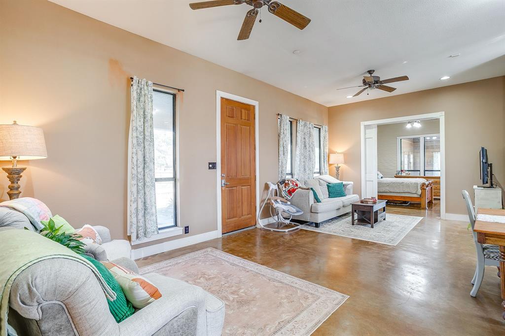 4200 Farm To Market 920 Weatherford, TX 76088 - Photo 6 of 40 a living room with furniture and a wooden floor