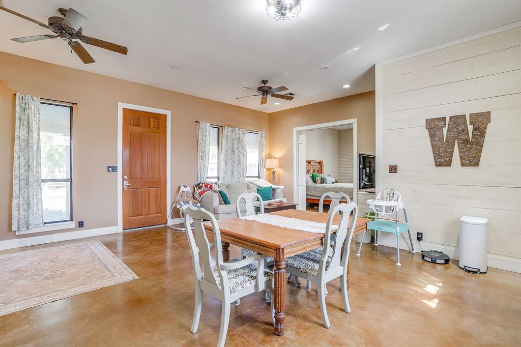 4200 Farm To Market 920 Weatherford, TX 76088 - Photo 10 of 40 a view of a dining room with furniture and a chandelier fan