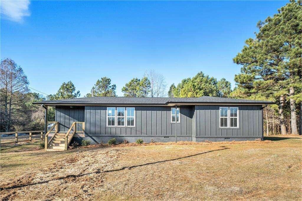 126 Pollard Road Bremen, GA 30110 - Photo 1 of 1 a front view of a house with a patio