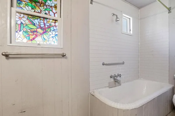 a bathroom with a sink and a tub