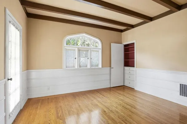 a view of an empty room and window