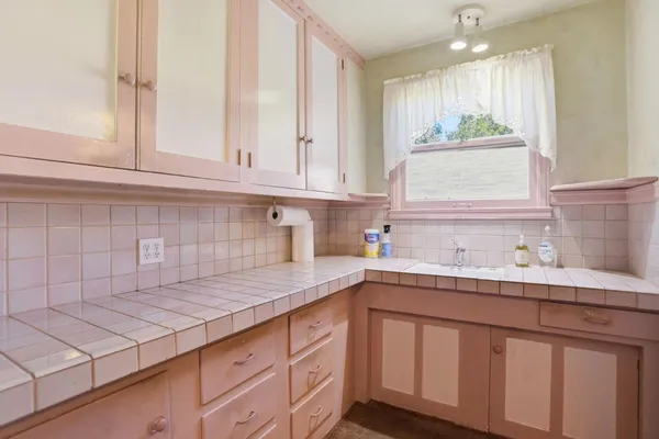 a view of kitchen with washer and dryer