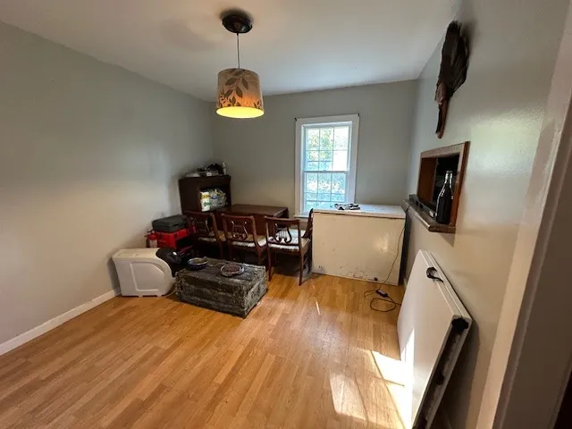 a bed room with a bed furniture and a flat screen tv